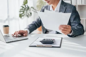 Trusted Tax Professionals in La Vista, NE taxrelief computer man paper image webp 1 300x200